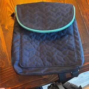 Thirty-one brand Quilted Navy Backpack with Teal Trim, lots of pockets.